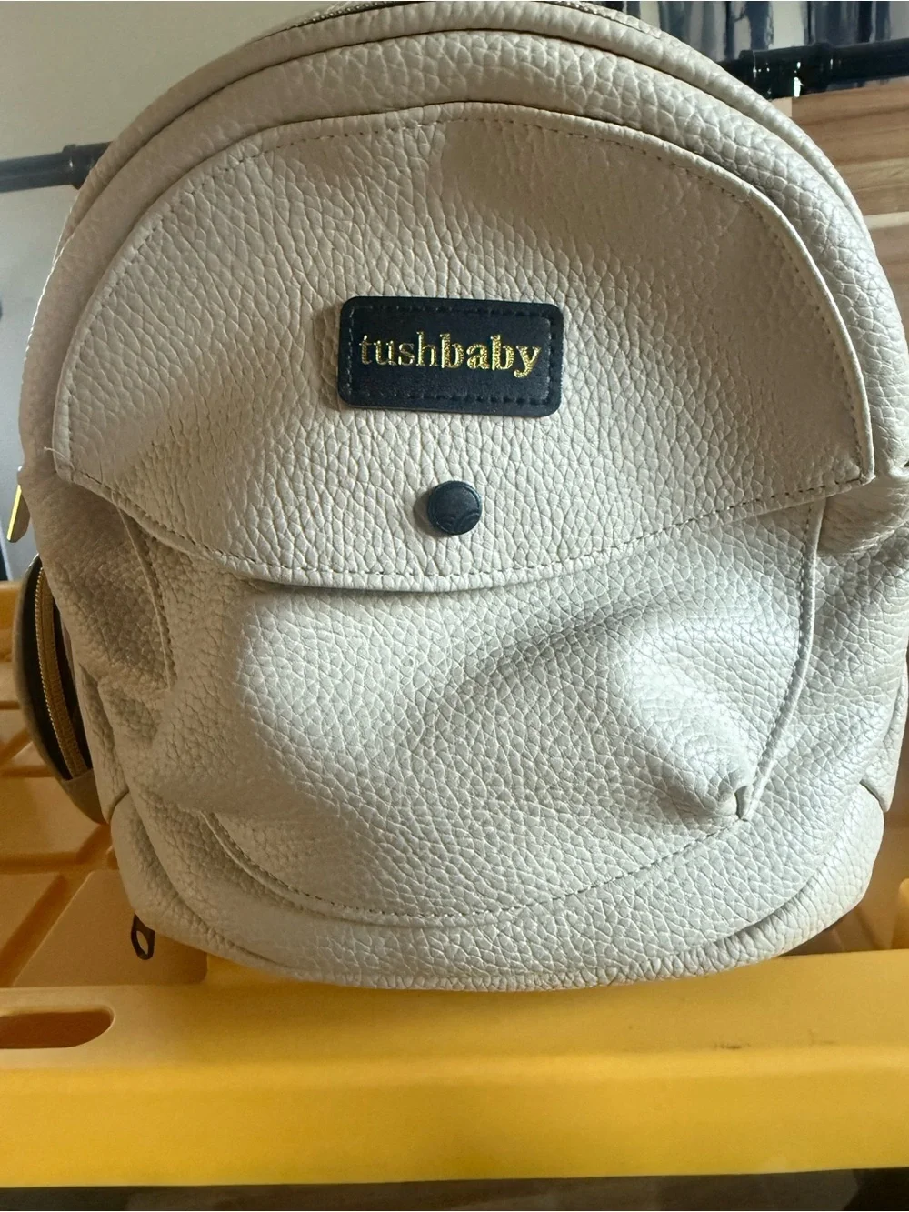 Tushbaby Cream Pebbled Leather Baby Bag